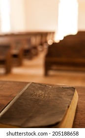 A Bible lying on the pulpit in a church.  Cades Cove, Great Smoky Mountains National Park, TN, USA. - Shutterstock ID 205188658