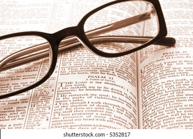 Bible Open To Psalm 23, With Reading Glasses.