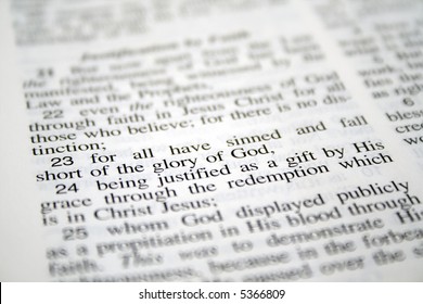 Bible Opened To Romans 3:23