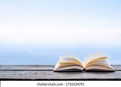 The Bible placed on the table was opened for learning to understand the Bible in order to pray to God and to ask God to protect himself and his family. The concept of Bible learning and faith in God
 - Shutterstock ID 1710134791