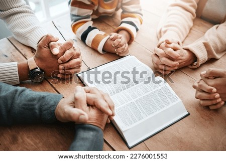 Bible, reading book or hands of big family praying for support or hope in Christian home for worship together. Mother, father or grandparents studying, prayer or asking God in religion with children