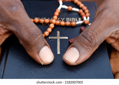 Bible Study. Close-up On Hands And Prayer Beads. Lome. Togo. 