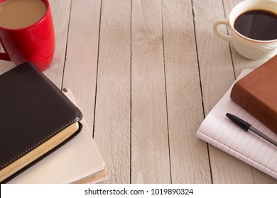 Bible Study and a Cup of Coffee with a Friend on a Wooden Table