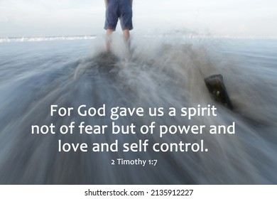 Bible Verse Quote - For God Gave Us A Spirit Not Of Fear But Of Power And Love And Self Control. 2 Timothy 1:7 With Person Standing Alone On Strong Waves Motion On Beach. Christianity Words.