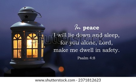 Bible verse quote - In peace I will lie down and sleep, for you alone, LORD, make me dwell in safety. Psalms 4:8. With lantern light shine in the dark night. Christianity concept.