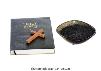 Bible With A Wooden Cross And A Bowl Of Ash For Ash Wednesday.