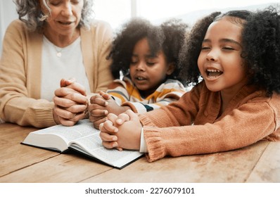 Bible, worship or grandmother praying with kids or siblings for prayer, support or hope in Christianity. Children education, family or old woman studying, reading book or learning God in religion - Shutterstock ID 2276079101
