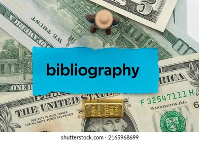 bibliography.The word is written on a slip of paper,on colored background. professional terms of finance, business words, economic phrases. concept of economy.