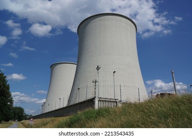 BIBLIS, GERMANY - Jun 11, 2022: Cooling Towers Of Unit B Of The Nuclear Power Plant Biblis, Hesse, Germany Against Blue Summer Sky  The Plant Is Shut Down 