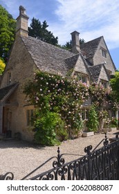 BIBURY, ENGLAND - JUNE 10, 202: Beautiful Cottages In The English Countryside, Bibury Town In The Cotswolds, England.