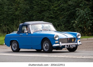Bicester, Oxon, UK, October 10th 2021. 1964 Blue MG Midget classic sports car