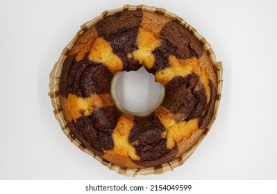 Bicolor Cake On A Baking Sheet Isolated On White Background. Top View