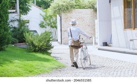 Bicycle and Asian senior man - Powered by Shutterstock