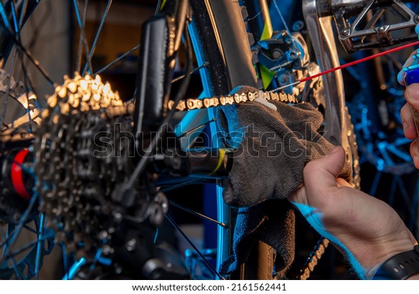 Bicycle chain cleaning.\
Bike maintenance