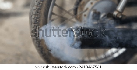 Bicycle emits smoke, hinting at a mechanical woe. Potential issues may range from a worn-out chain to brake troubles. Inspection recommended.