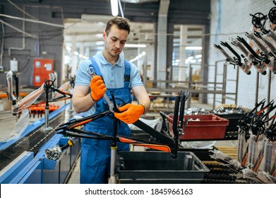 Bicycle Factory, Worker Holds Teen Bike Frame