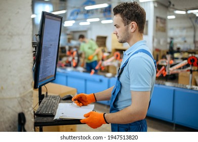 Bicycle Factory, Worker Manages Bike Assembly Line