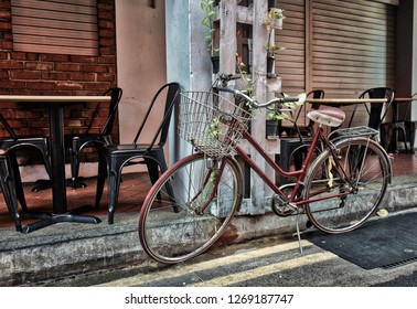 Bicycle in front of store front