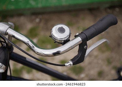 Bicycle handlebar bell closeup on a city bike - Powered by Shutterstock