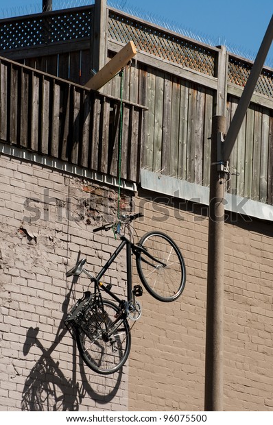 Bicycle Hung Off City Patio Clever Stock Photo Edit Now 96075500