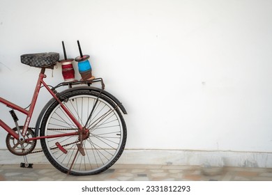 bicycle with kite flying thread spools charkhi on the carrier showing the celebrations of this festival in rajasthan gujarat delhi india with copy space