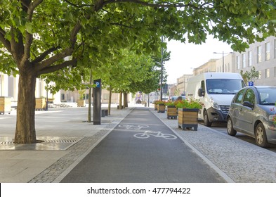 Bicycle Lane Under The Trees On City Street. Perfect Cycling Infrastructure In The City.