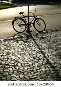Bicycle locked to the column