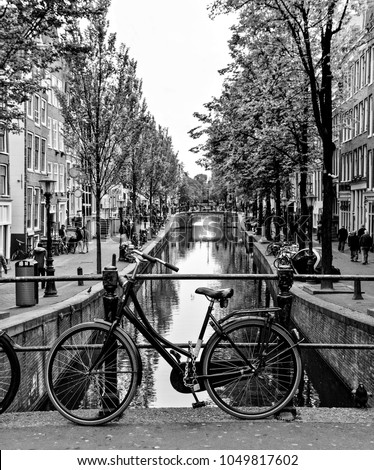Bicycle on an Amsterdam canal bridge.