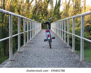 Bicycle on a bridge, rear view