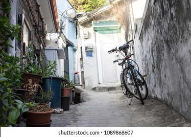 Bicycle On An Empty Alley(narrow Alley)