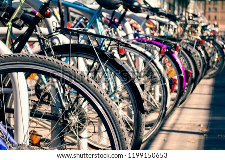 Similar – Image, Stock Photo Many bicycles parked at a public bike rack in Copenhagen