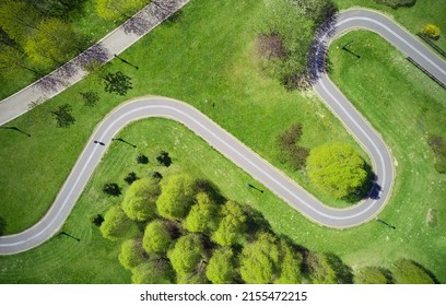 Bicycle path in the park. Ecosystem and healthy environment concepts and background. - Shutterstock ID 2155472215