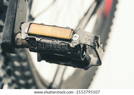 Bicycle pedal with Cateye reflex, Close up. Top view. Shallow depth of field