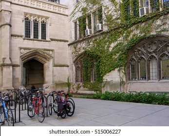 Bicycle Rack In Quadrangle Of College Campus With Ivy Covered Building