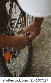 Bicycle Repair. Man Repairing Bike.