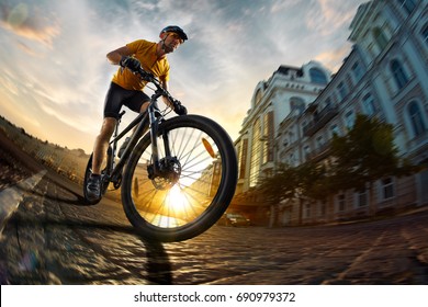 Bicycle Rider  Cycle In City Street Fish Eye View Sunset