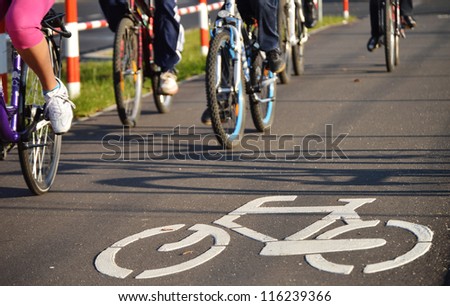 Bicycle road sign on asphalt. Leisure activities