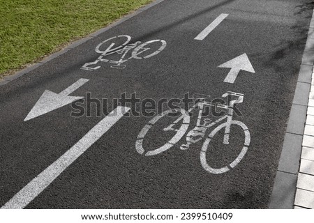 Similar – Foto Bild Fahrrad-Zone Fahrbahnbeschriftung