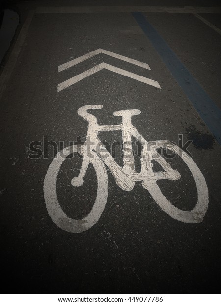 Bicycle sign or\
icon, Bike lane in city\
street