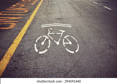 Bicycle Symbol On City Street. Bike Sign On The Road. Bike Lane. Vintage Effect.