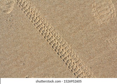 Bicycle Tracks On A Sand In Summer, Abstract Background