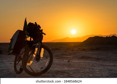 Bicycle for travel at an amazing sunrise in the Middle East