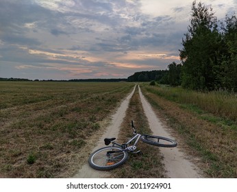 Bicycle under the cloudy sky