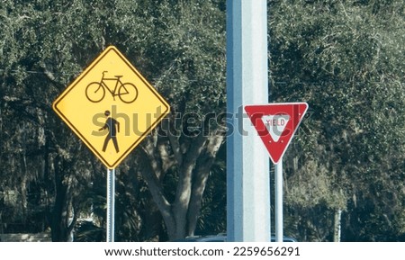 bicycle and walking lane and yield sign