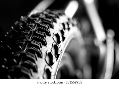 Bicycle wheel and tire close up on tread abstract