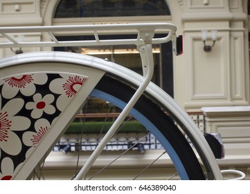Bicycle wheels in the background of the store