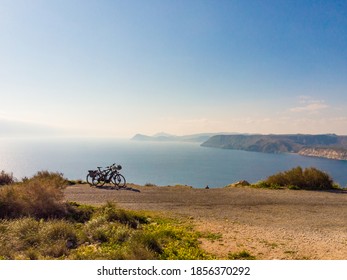 Bicycles on coast, Mesa Roldan headland in province Almeria, Andalusia Spain. Cabo de Gata Natural Park. Active holidays.