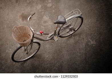 Bicycles Parked On Concrete Patio.Bicycle Top View Photo.bike.Bike Front Basket