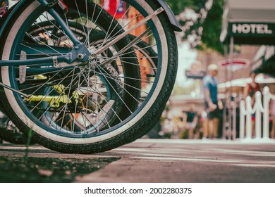 Bicycles Parked On Suburban Town Sidewalk Urban Downtown Scene Cinematic Low Angle