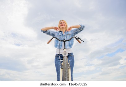 Bicycling Hobby And Best Way To Relax And Reduce Stress. Girl Relaxed And Free Sit On Bike. Top Mental Benefits Of Cycling. Everyday Bicycling Make You Happier. Woman Enjoy Freedom While Riding.